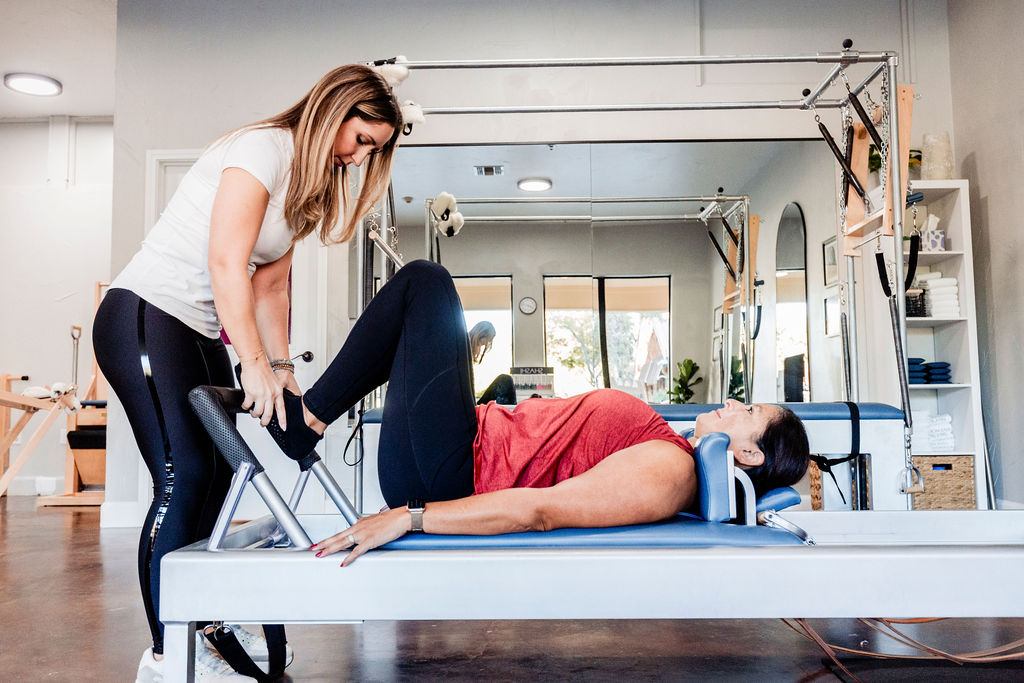 Instructor leading private classical Pilates session in New Braunfels